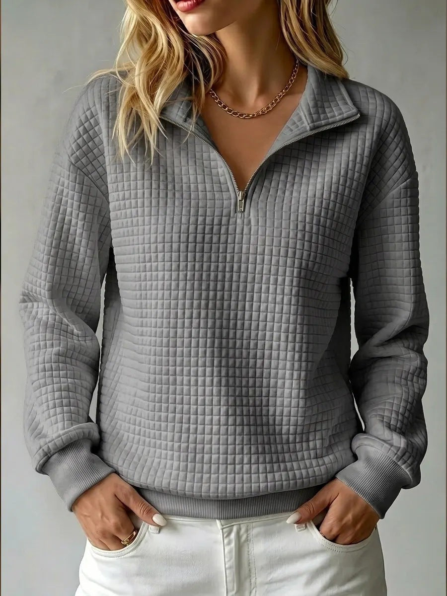 Evi | Sweater met ruitjes en halve rits