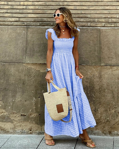 Linda | Geruite maxi-jurk met korte ruchemouwen